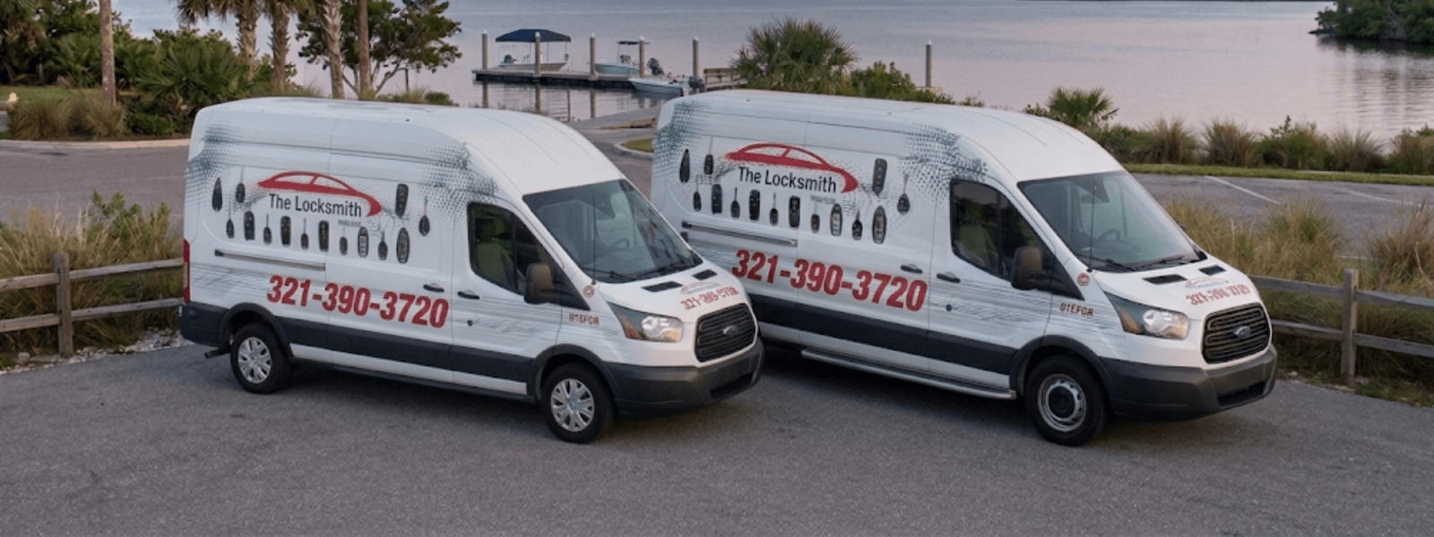 Two Locksmith Rescue vans parked on the Palm Bay waterfront